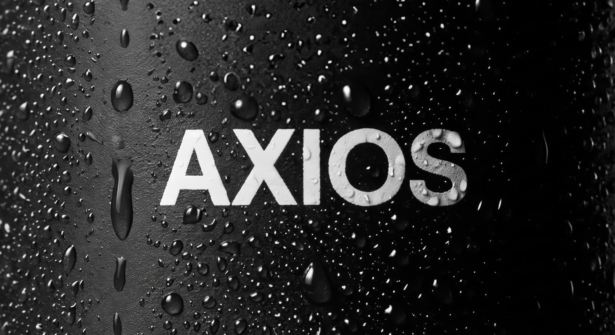 The Axios wordmark in white on a black bottle covered in water droplets
